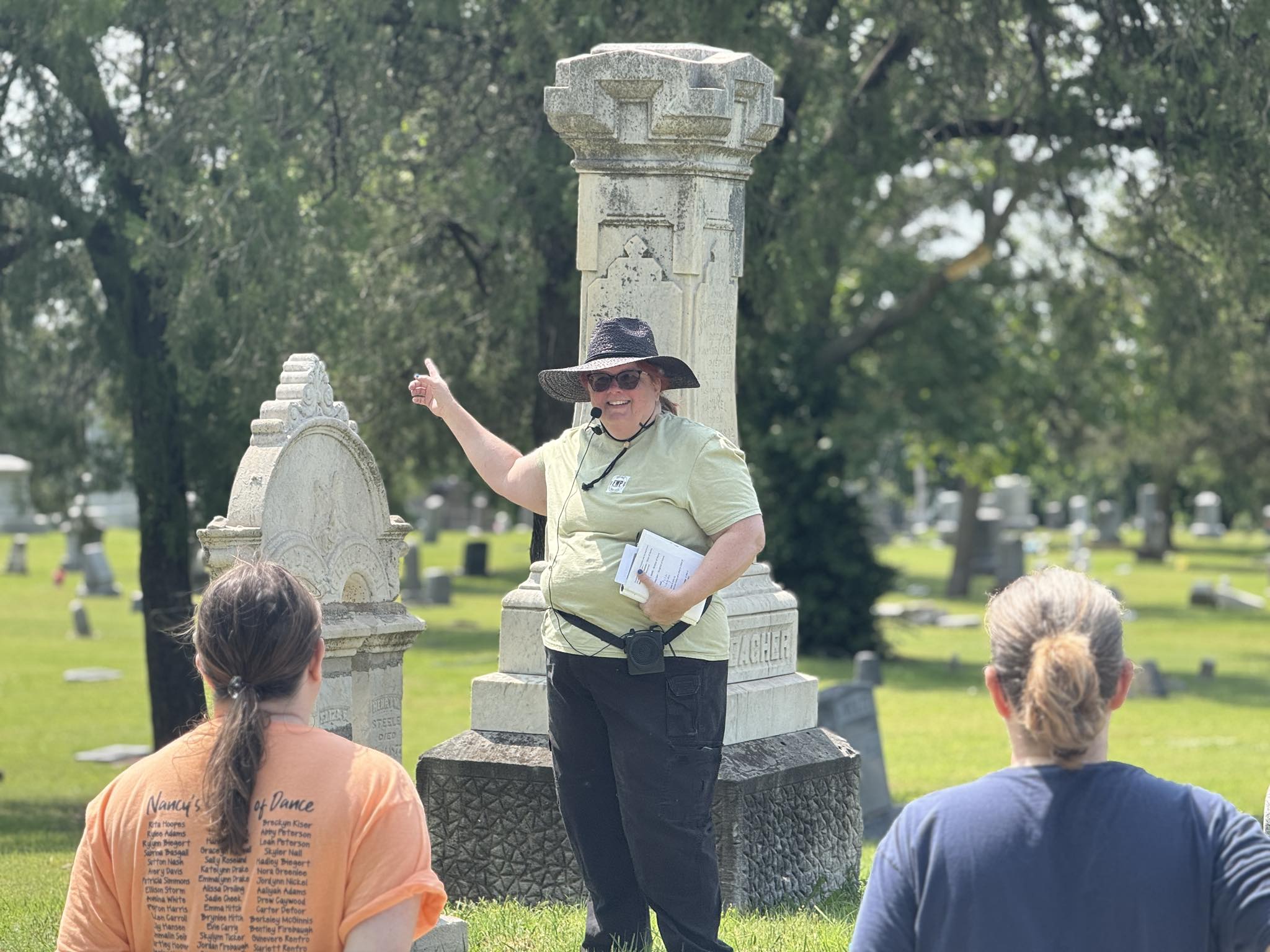 Barb speaking at cemetery